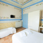Camera tripla con vista giardino B&B-Porta Perugina 3